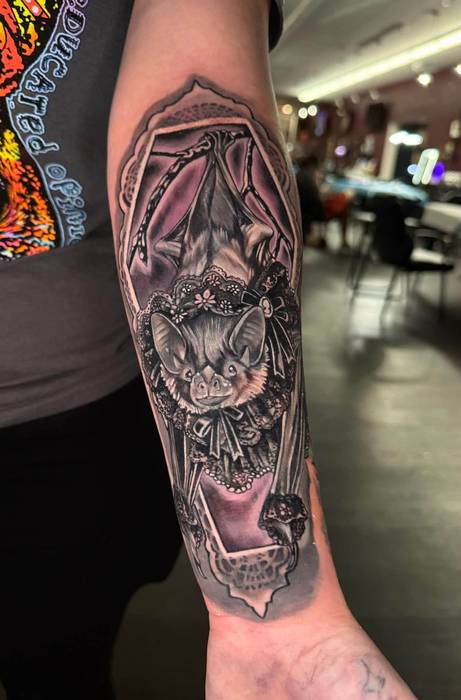 Dark black-and-gray vampire tattoo by Justin Styndl